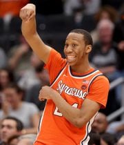 Syracuse Orange guard Quadir Copeland (24) from the bench after a made Syracuse basket. The Syracuse Orange basketball team played at  Georgetown on Dec. 9, 2023. Dennis Nett | dnett@syracuse.com