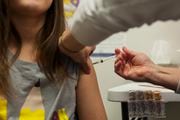 RN Debbie Werette gives Kaitlynn Palmer, 11, four vaccinations and a nasal spray flu vaccine on Thursday, Feb. 19, 2015, at the Genesse County Health Department in Burton. Palmer, who is now up to date on all her immunizations, received four shots including Tdap,a tetanus-diphtheria-pertussis vaccine, Hepatitis A, a vaccine against the hepatitis A virus, Gardasil, an HPV vaccine, and a Meningococcal vaccine to prevent meningitis. Sam Owens | MLive.com Sam Owens | MLive.com