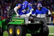 Buffalo Bills linebacker Terrel Bernard (43) rides off the field on a cart after an injury during the third quarter of an NFL wild-card playoff football game against the Pittsburgh Steelers, Monday, Jan. 15, 2024, in Buffalo, N.Y. (AP Photo/Adrian Kraus)
