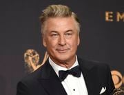 FILE - Alec Baldwin poses in the press room with the award for outstanding supporting actor in a comedy series for "Saturday Night Live" at the 69th Primetime Emmy Awards in Los Angeles on Sept. 17, 2017. Prosecutors in New Mexico plan to drop an involuntary manslaughter charge against Alec Baldwin in the fatal 2021 shooting of a cinematographer on the set of the Western film “Rust.” Baldwin’s attorneys said in a statement Thursday that they are pleased with the decision to dismiss the case. (Photo by Jordan Strauss/Invision/AP, File)