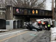 A car flipped Monday afternoon on Syracuse's West Side, on West Fayette Street between Magnolia and South Geddes streets.