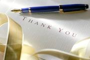 Close up of a thank you note. Shot with shallow depth of field