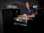 Detective Alexander Hebert was assigned to Carol Ryan's cold case in 2021. At the Onondaga County Sheriff's Office, there is a whole filing cabinet filled with documents for her case, but her murder remains unsolved after 27 years.