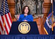 New York Gov. Kathy Hochul presents her 2025 executive state budget in the Red Room at the state Capitol Tuesday, Jan. 16, 2024, in Albany, N.Y. (AP Photo/Hans Pennink)