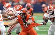 Syracuse Orange defensive lineman Kevon Darton (0) is held (no call) .Syracuse football vs Clemson played at the JMA Wireless Dome Sep.30, 2023. Dennis Nett | dnett@syracuse.com