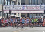 The start of the race. Hundreds participate in the 23rd Annual Paige’s Butterfly Run, part of the 2019 Taste of Syracuse in downtown Syracuse, June 8, Michael Greenlar | mgreenlar@syracuse.com Michael Greenlar | mgreenlar@syracuse.com