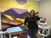 Heather Drake Bianchi stands in one of the patient rooms at Drakos Pediatric Urgent Care, in Clay Medical Center. Sept. 15, 2023.