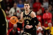 Purdue guard Braden Smith (3) in action during the first half of an NCAA college basketball game against Maryland, Tuesday, Jan. 2, 2024, in College Park, Md. (AP Photo/Nick Wass)