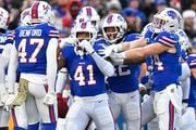 Buffalo Bills fullback Reggie Gilliam (41) celebrates with cornerback Christian Benford (47), linebacker Dorian Williams (42) and linebacker Tyler Matakevich (44) after recovering a fumble on the opening kickoff during the first half of an NFL football game against the New York Jets in Orchard Park, N.Y., Sunday, Nov. 19, 2023. (AP Photo/Adrian Kraus)