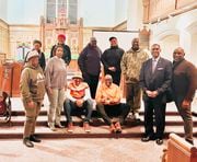 Rehearsing for a presentation of Langston Hughes’s “Black Nativity” are, from left, front row--Charlene Phillips, Mary Carroll, Priyantha Fernando, H. Bernard Alex and Gregory Sheppard; back row--Marcia Hagan, Ava Andrews, Georgia Adams, Sandra Miller and Michael Jones. The music from “Black Nativity” will be paired with Bach’s “Magnificat” Dec. 3 at St. Stephen Lutheran Church.