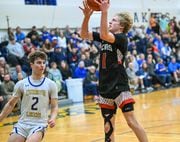 From left, Jack Byrnes of Cazenovia guards against Ryan Moesch of Chittenango as he goes for a layup in boys basketball at Cazenovia High School, Jan. 12, 2023
Mark DiOrio | Contributing Photographer