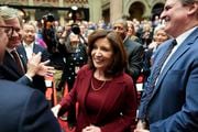 New York Gov. Kathy Hochul greets people as she arrives to deliver her State of the State address in Albany, New York, Tuesday, Jan. 9, 2024. The Democrat outlined her agenda for the ongoing legislative session, focusing on crime, housing and education policies. (Seth Wenig | AP Photo)