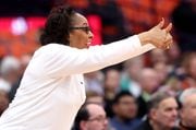 Felisha Legette-Jack signals for a jump ball after a loose ball scramble. The Syracuse Orange Women’s basketball team takes on the Clemson Tigers, Jan. 14, 2024 at the JMA Wireless Dome in Syracuse N.Y.  ( Dennis Nett | dnett@syracuse,com )