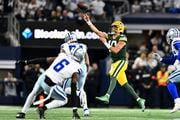 Green Bay Packers quarterback Jordan Love (10) throws a pass during the first half against the Dallas Cowboys of an NFL wild-card playoff football game Sunday, Jan. 14, 2024 in Arlington, Texas. (AP Photo/Maria Lysaker)