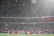 Snow falls as the Buffalo Bills and Miami Dolphins play each other during the second half of an NFL football game Saturday, Dec. 17, 2022, in Orchard Park, N.Y. (AP Photo/Joshua Bessex)