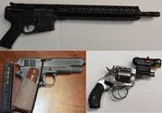 Police recovered three guns while arresting two people accused of robbing a DeWitt smoke shop on Nov. 24, 2023.
