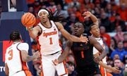 Syracuse Orange forward Maliq Brown (1) creates a turnover. The Syracuse men’s basketball team host the Miami Hurricanes at the JMA Wireless Dome Jan 20, 2024.   (Dennis Nett | dnett@syracuse.com)