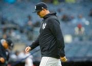 New York Yankees manager Aaron Boone walks back to the dugout after making a pitching change in the seventh inning during a baseball game against the Arizona Diamondbacks, Sunday, Sept. 24, 2023, in New York. (AP Photo/John Munson)