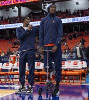 Syracuse Orange center Naheem McLeod (10) watches warmups with a foot injury as the Orange hosted the Eagles Wednesday, January 10, 2024 at JMA Wireless Dome. (N. Scott Trimble | strimble@syracuse.com)