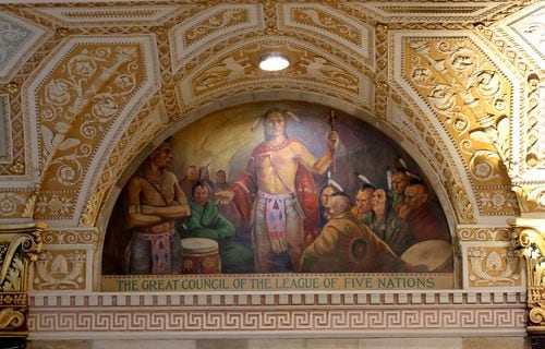 Palladian Hall features 10 historic scenes painted by William Tefft Schwarz, showing key moments in Syracuse history. This arch shows the Great Council of the League of the Five Nations.

Palladian Hall is part of The Treasury, a renovated rebrand in the space formerly known as the Onondaga County Savings Bank at 101 S. Salina St., Syracuse. (Katrina Tulloch)