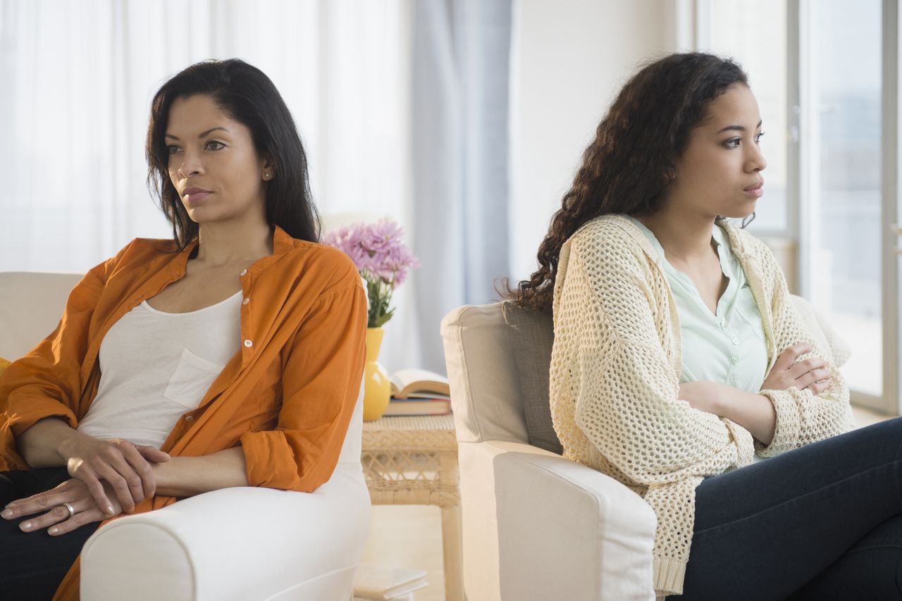 Woman ignoring another woman