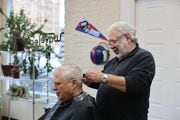 Nick Castrello cuts hair six days a week at Wave Lengths Cutting Salon at 231 E. Washington St. (Katrina Tulloch)