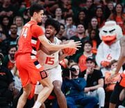 Miami center Norchad Omier, shown in a game against Syracuse last season, is out with an injury and won't play against the Orange today. N. Scott Trimble | strimble@syracuse.com